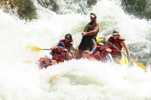 Family in whitewater rapids on the Alberton Gorge